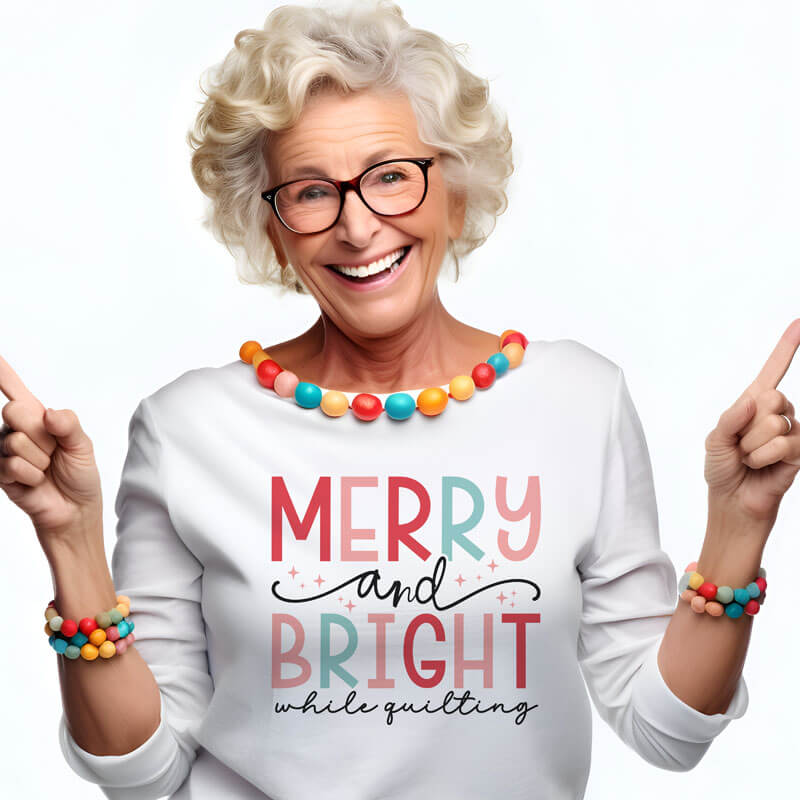 Merry and Bright While Quilting Long Sleeve Tee