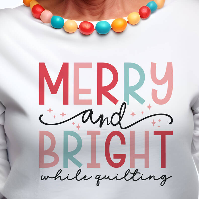 Merry and Bright While Quilting Long Sleeve Tee